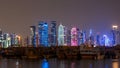 A panoramic view of the old dhow harbour night timelapse in Doha, Qatar, with the West Bay skyline in the background. Royalty Free Stock Photo