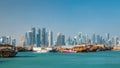 A panoramic view of the old dhow harbour timelapse in Doha, Qatar, with the West Bay skyline in the background. Royalty Free Stock Photo