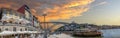 Panoramic view with old multi-colored houses in Porto Ribeira and Dom Luis I Bridge over Douro river in sunset. Porto, Portugal Royalty Free Stock Photo