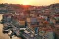 Panoramic view of Old Porto. View of traditional boats in the morning on river Douro with Porto city in the background, Portugal