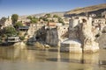 Panoramic view of the Old Tigris Bridge, Castle and minaret in the city of Hasankeyf, Turkey. Royalty Free Stock Photo