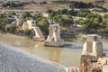 Panoramic view of the Old Tigris Bridge, Castle and minaret in the city of Hasankeyf, Turkey. Royalty Free Stock Photo