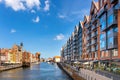 Panoramic view of old town city center at Motlawa river with Hanseatic tenement houses and Storehouse Island modern housing - Royalty Free Stock Photo