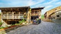 Panoramic view of an old town with stone houses, wooden balconies and cobbled streets. Barcena Mayor Santander