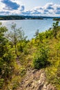 Panoramic view of Oslofjord harbor from rocky recreational cape of Hovedoya island near Oslo, Norway, with Londoya island in