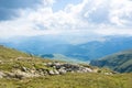 Panoramic view over the Carpatian mountains, green valleys and b Royalty Free Stock Photo