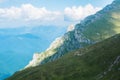 Panoramic view over the Carpatian mountains, green valleys and b Royalty Free Stock Photo