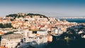 Panoramic view over the center of Lisbon from the viewpoint called: Miradouro de Sao Pedro de Alcantara featuring the