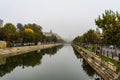 Panoramic view over Dambovita River in a foggy day in Bucharest, Romania, 2019 Royalty Free Stock Photo