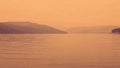 Panoramic view over a lake. Color graded for a vintage look