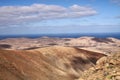 Panoramic view over the mountains of Betancuria to Atlantic ocean, Fuerteventura, Canary Islands Royalty Free Stock Photo