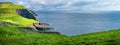 Panoramic view over mythical Faroe Island Mykines in the middle of Atlantic Ocean with a lot of puffins, parrot like seabirds,