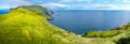 Panoramic view over mythical Faroe Island Mykines in the middle of Atlantic Ocean with a lot of puffins, parrot like seabirds, and