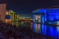 Panoramic view over river Spree in Berlin to illuminated Paul-Loebe building and Reichstag during evening twillight in summer