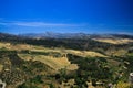 Panoramic view over rural wide valley contrasting with cloudless blue sky from ancient village Ronda - Andalusia, Spain Royalty Free Stock Photo