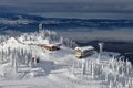 Panoramic view over the ski slope Poiana Brasov ski resort in Transylvania, Pine forest covered in snow on winter season,Mountain