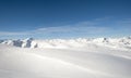Panoramic view over a snowy mountain range Royalty Free Stock Photo
