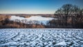 Panoramic view overlooking Blue Marsh Lake in winter with a snowy field in the foreground