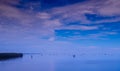 Panoramic view of oyster farm, the horizon where the sky meets the sea.