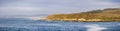 Panoramic view of the Pacific Ocean coast in Montara de Oro State Park during goldenhour; Morro bay and Morro rock in the Royalty Free Stock Photo