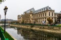 Panoramic view of Palace of Justice reflected in Dambovita River, in downtown Bucharest, Romania, 2019 Royalty Free Stock Photo