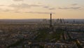 Panoramic view of Paris downtown, France with famous Eiffel Tower, park area Champ de Mars and skyscrapers of La Defense. Royalty Free Stock Photo