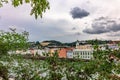 Panoramic view of Passau. View through tree branches. Aerial skyline of old town with beautiful reflection in Danube