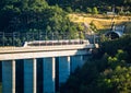 Panoramic view on passenger train TGV crossing the railway flyover. Royalty Free Stock Photo