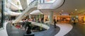 Panoramic View Of People Crowd Rush In Shopping Luxury Mall Interior