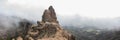 Panoramic view of `Pico de las Nieves`, near Tejeda surrounded by clouds on the island of Gran Canaria Royalty Free Stock Photo