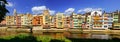 Panoramic view of the picturesque colorful houses next to the Onyar River as it passes through the old city of Girona Royalty Free Stock Photo