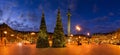 Panoramic view of Place Vendome with Christmas trees, holiday decorations and the Vendome Column at dusk. Paris, France