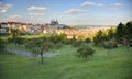 A panoramic view of Prague City under blue sunny sky with Prague Castle and St. Vitus Cathedral on the left Royalty Free Stock Photo