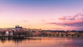 Panoramic View of Prague gothic Castle with Charles Bridge after Sunset, Czech Republic Royalty Free Stock Photo