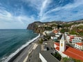 Panoramic view of Praia de Vigario in Camara de Lobos on Madeira island, Portugal, Europe. Black stone beach in Atlantic Ocean Royalty Free Stock Photo