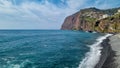 Panoramic view of Praia de Vigario in Camara de Lobos on Madeira island, Portugal, Europe. Black stone beach in Atlantic Ocean Royalty Free Stock Photo