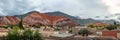 Panoramic view of Purmamarca town with Cerro de los siete colores on background - Purmamarca, Jujuy, Argentina Royalty Free Stock Photo