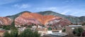 Panoramic view of Purmamarca town with Cerro de los siete colores on background - Purmamarca, Jujuy, Argentina Royalty Free Stock Photo