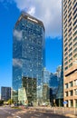 Panoramic view of Q22 office tower of Echo Investment at al. Jana Pawla II avenue in Wola downtown district of Warsaw, Poland Royalty Free Stock Photo