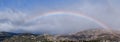 Panoramic view of the rainbow over La Pedriza. Royalty Free Stock Photo