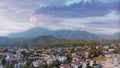 Panoramic view of the resort town against the backdrop of mountains. Top view. Aerial drone video footage.