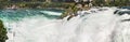 Panoramic view of Rhine falls, Switzerland. Waterfall and rainbow. Royalty Free Stock Photo