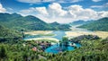 Panoramic view of  Rijeka Crnojevica river, Skadar lake location. Amazing summer scene of Karuc village, Montenegro, Europe. Royalty Free Stock Photo