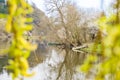 Panoramic view of river with emerald water and boats in the early spring Royalty Free Stock Photo