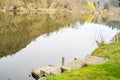 Panoramic view of river with emerald water and boats in the early spring Royalty Free Stock Photo