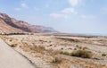 Panoramic view of the road, coast of Dead Sea and mountains in the Judean Desert in the Dead Sea region in Israel Royalty Free Stock Photo