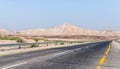 Panoramic view of the  road and the Judean Desert in the Dead Sea region in Israel Royalty Free Stock Photo