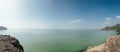 Panoramic view on rock islands on a sea in Ha Long Bay. Cat Ba, Vietnam Royalty Free Stock Photo