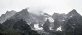Panoramic view of the rocky peaks of the Mont Blanc massif in stormy weather Royalty Free Stock Photo