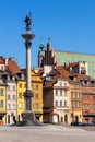 Panoramic view of Royal Castle Square - Plac Zamkowy - in Starowka Old Town with Sigismund III Waza Column and historic tenement Royalty Free Stock Photo